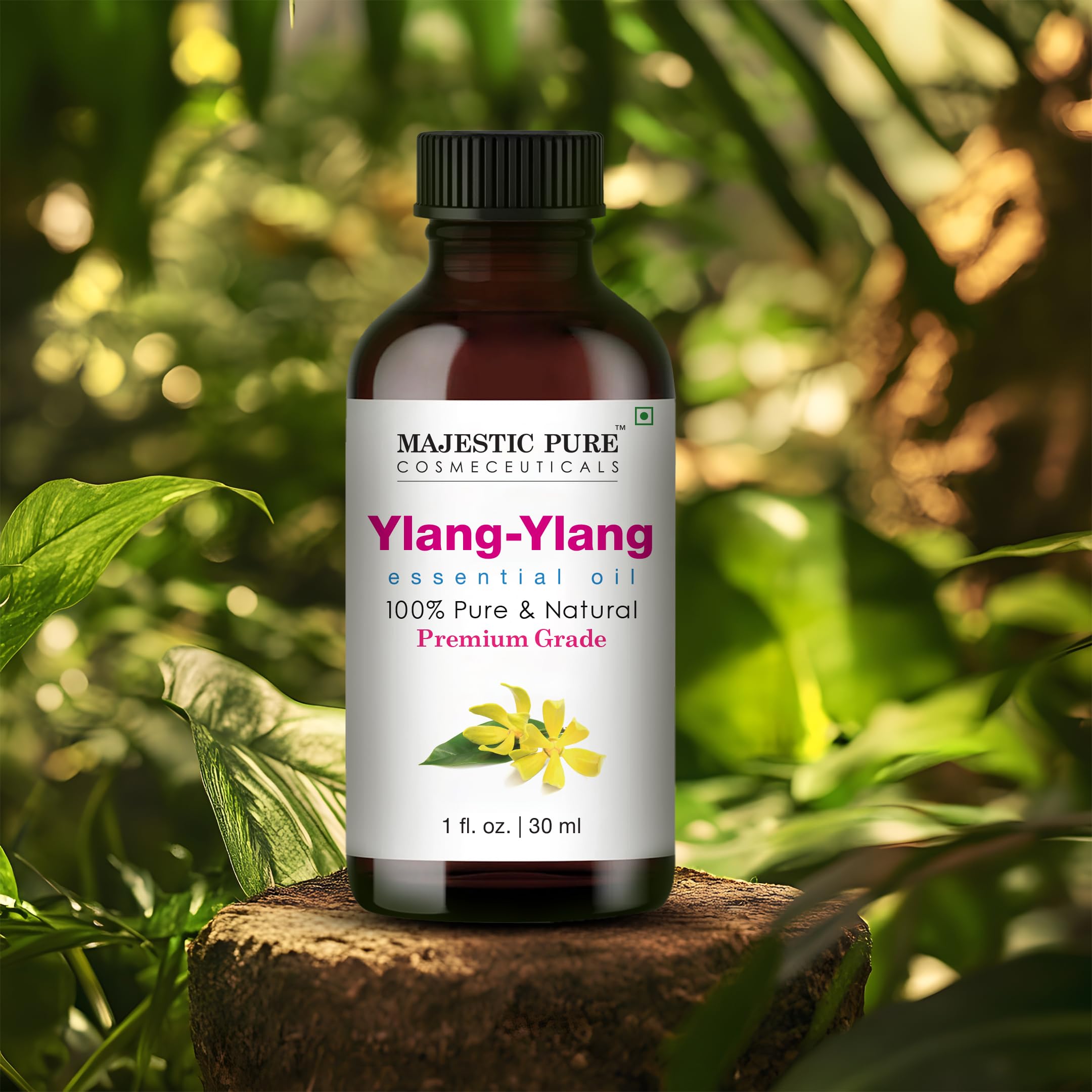 Aceite Majestic Pure Ylang Ylang en botella ámbar para conservar la fragancia.