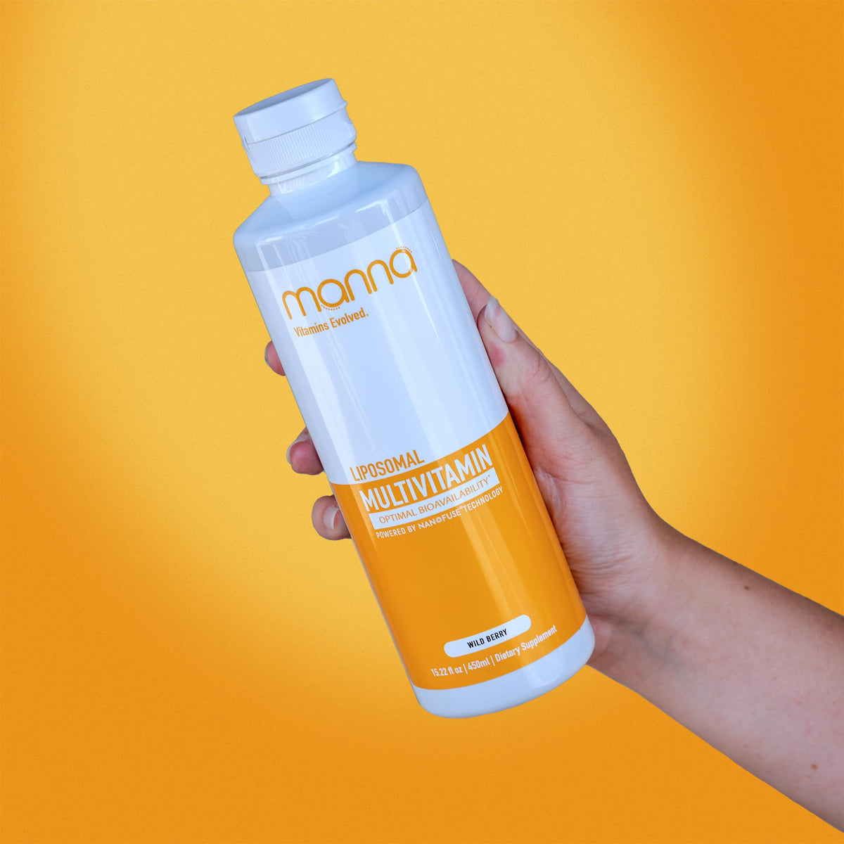 Manna Vitamins Evolved, botella frontal para impulso diario de energía