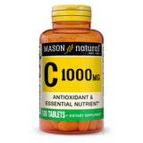 Mason Natural Vitamina C 1000 mg, botella en mesa, apoyo diario al sistema inmune.