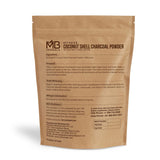 MB Herbals polvo en textura de carbón activado de coco, útil para exfoliar suavemente.