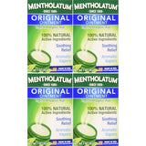 Aplicación en pecho con Mentholatum Original para alivio aromático.