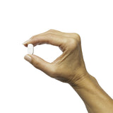 Metagenics glicinato de magnesio, cápsula detalle, alivio de tensión muscular.