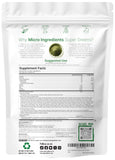 Micro Ingredients Super Greens Powder preparado para batidos, con colores y textura atractivos.