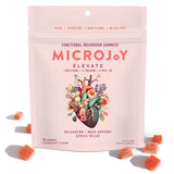 Microjoy Elevate, bolsa reutilizable con gomitas color rosa para equilibrio emocional.
