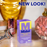 Midol comprimidos dos comprimidos, muestra la dosis para un alivio práctico.