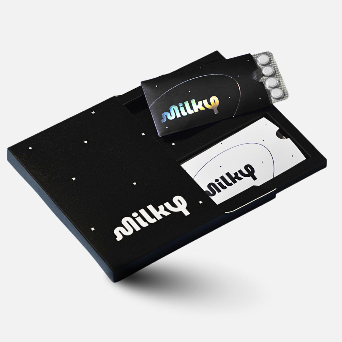 Milky pildoras intolerancia lactosa en caja, alivio para comer lácteos con comodidad.