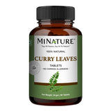 Tabletas minature en bote con hojas de curry, pura y natural para tu día a día.