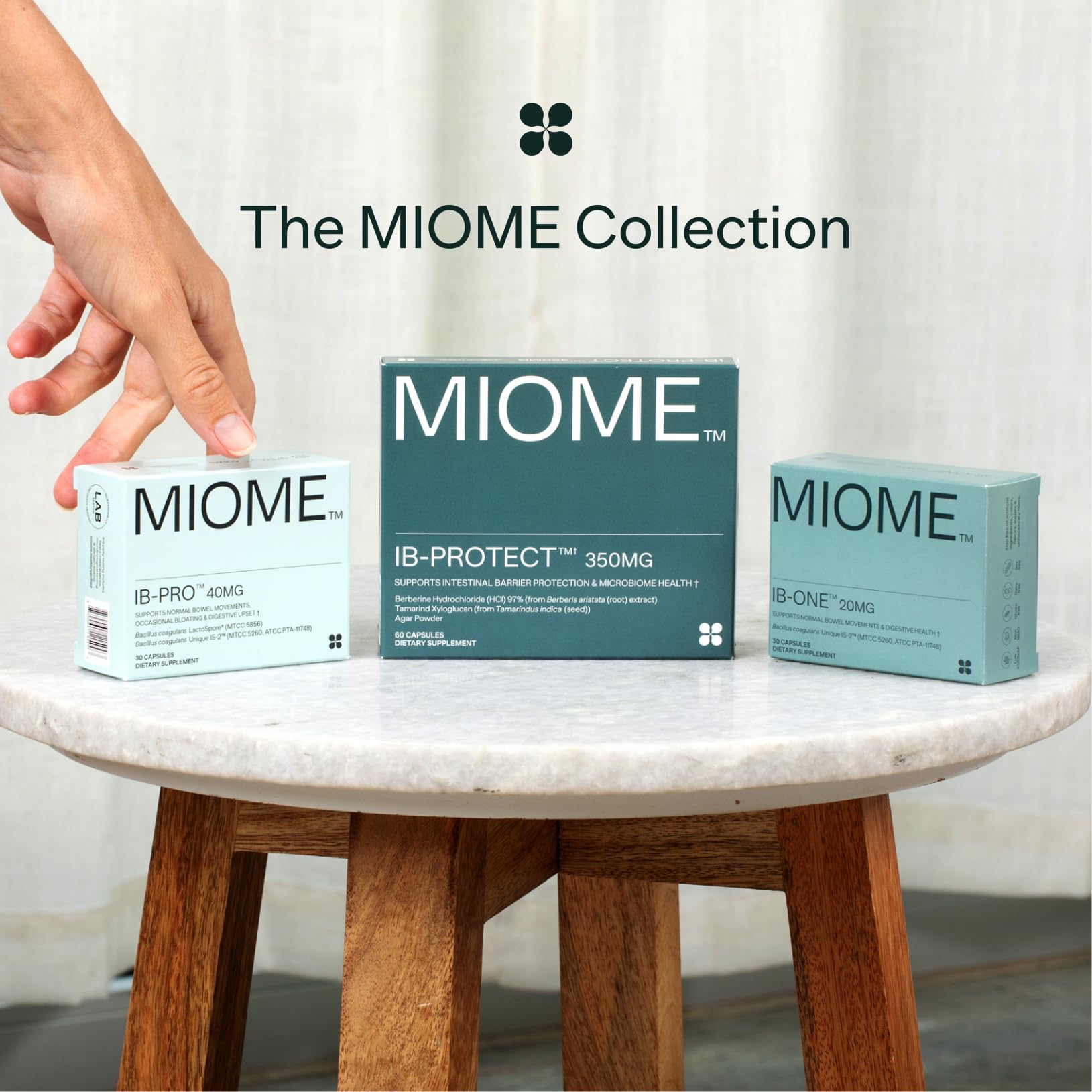 MIOME IB-ONE probiótico: caja del producto en su empaque, ideal para almacenamiento.