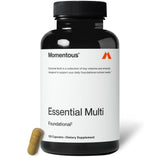 Momentous Esencial Multivitamin en botella, detalle de etiqueta para apoyo de energía y salud diaria.
