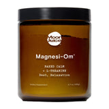 Moon Juice Magnesi-Om: bote en primer plano y apoyo para descanso y relajación.