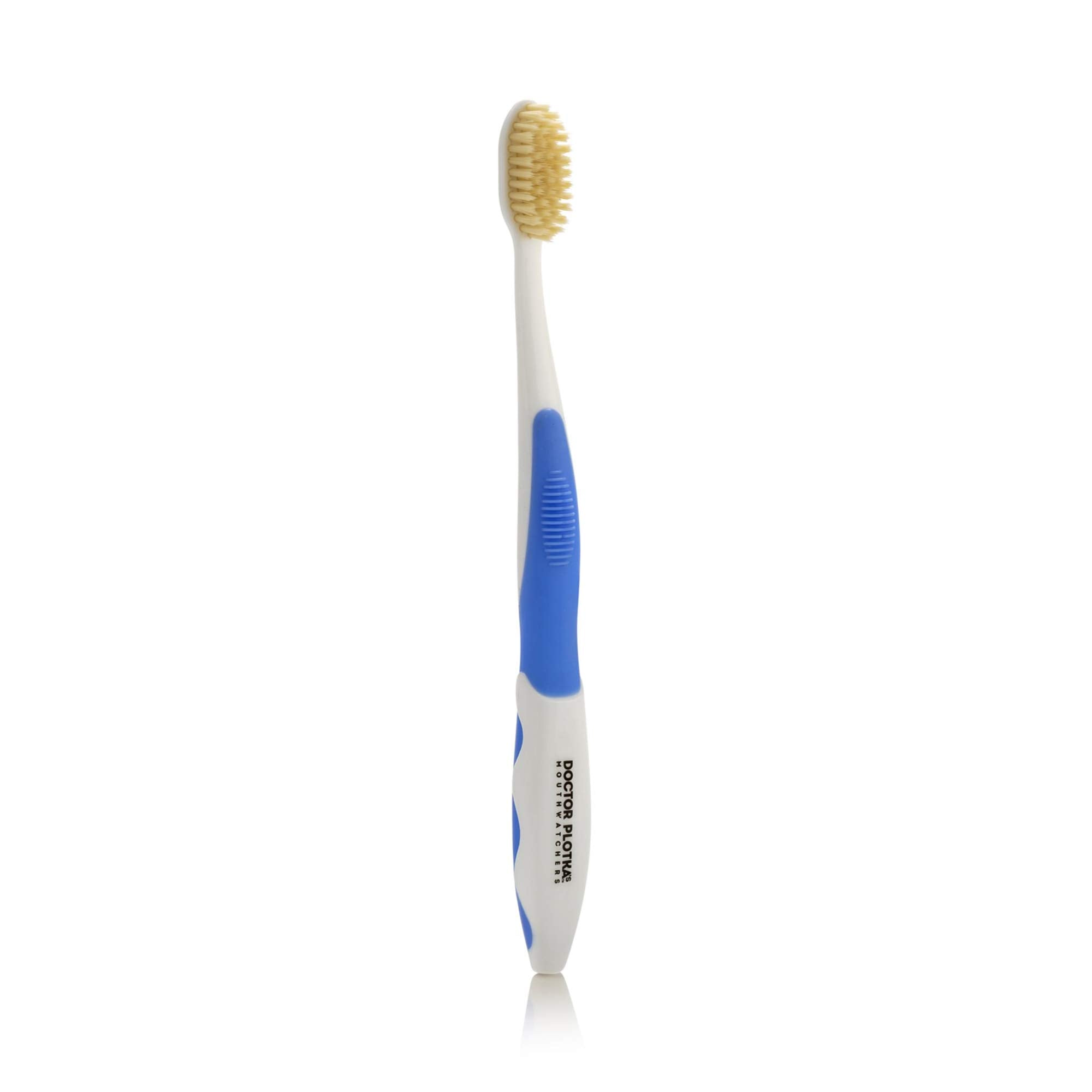 Cepillo MOUTHWATCHERS con cabezal suave para limpieza diaria.