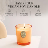 Vela M&SENSE albahaca-jengibre-naranja con iluminación cálida para crear ambiente