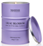 Vela M&SENSE Flor de Lila en caja regalo, ideal para aromatizar salas.