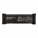 Barra MUSASHI proteina galletas crema en mesa, lista para consumir.
