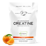 Muscle Feast Creapure frasco naranja, facilita entrenamientos consistentes gracias a la creatina pura.