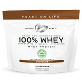 Muscle Feast whey proteína polvo chocolate, textura cremosa para batidos deliciosos.