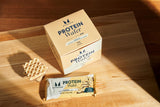 Barras proteicas con recubrimiento de chocolate leche, sabor suave