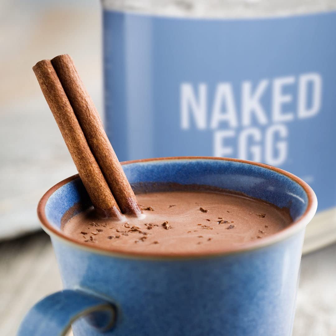 NAKED egg white protein serving scoop demonstrates convenient daily protein boost.