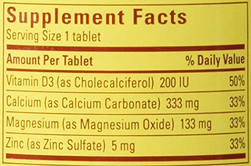 Nature Made calcio-magnesio-zinc comprimidos, primer plano de las tabletas para uso diario