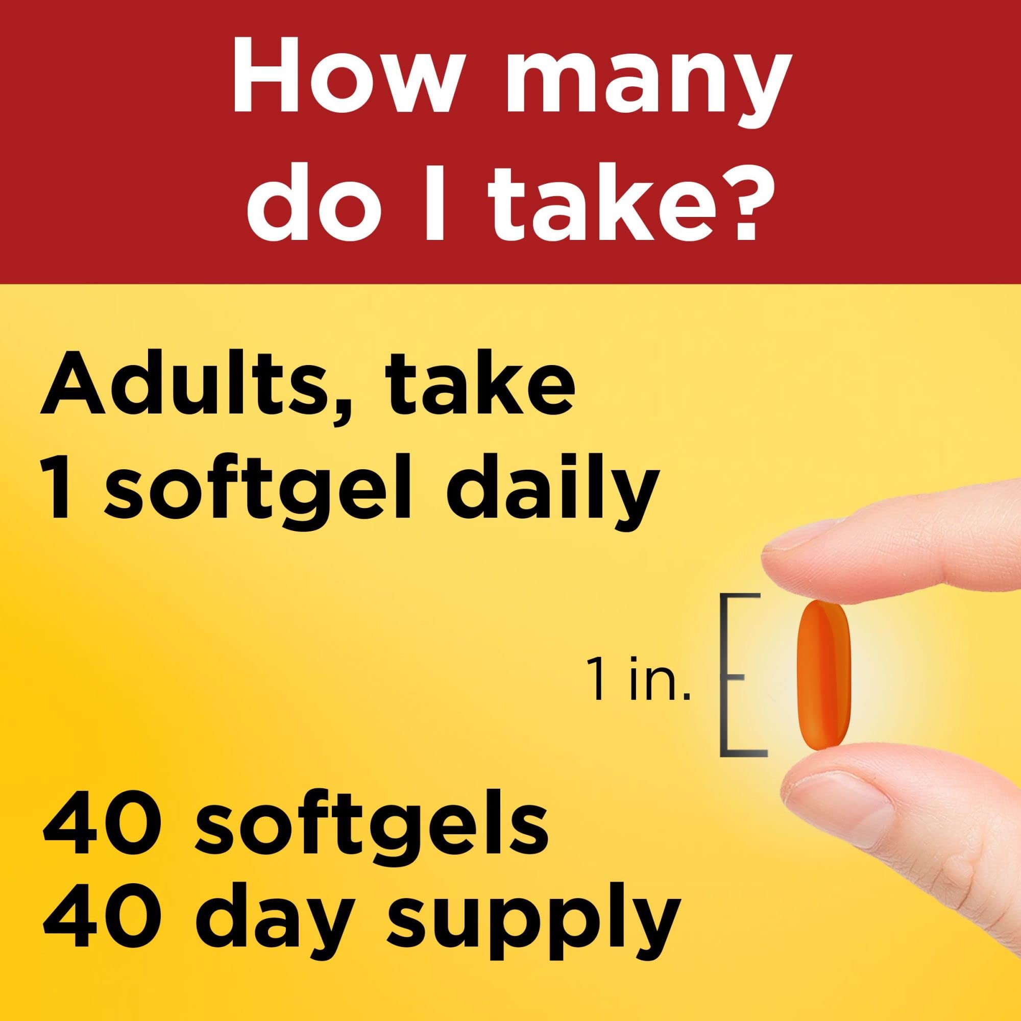 Nature Made CoQ10 400 mg cápsulas suaves en mano: fácil de tomar