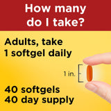 Nature Made CoQ10 400 mg cápsulas suaves en mano: fácil de tomar