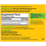 Nature Made Vitamina D3 tabletas, etiqueta visible, promueve absorción de calcio para huesos fuertes
