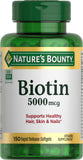 Nature's Bounty Biotina, botella con liberación rápida para cabello saludable.