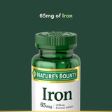 Nature's Bounty Hierro 65 mg, etiqueta de datos visibles para uso diario.