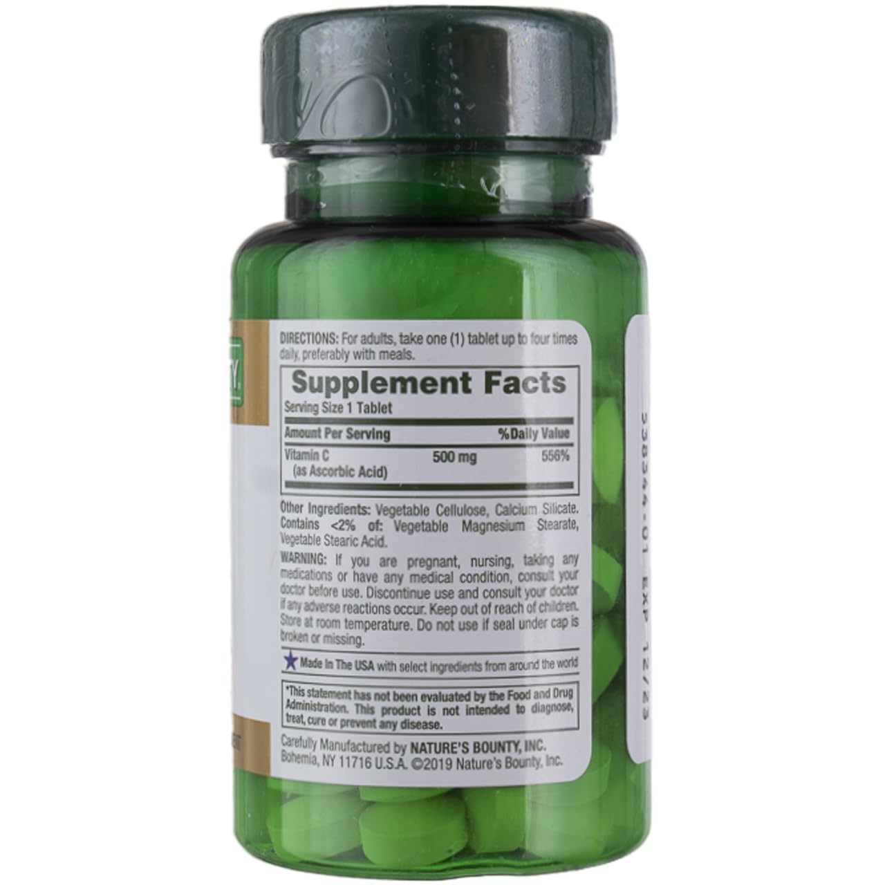 Nature's Bounty Vitamina C 500 mg, etiqueta visible, identificación rápida para la rutina.