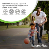 NaturesPlus Ultra Juice Green Drink vaso con bebida verde lista