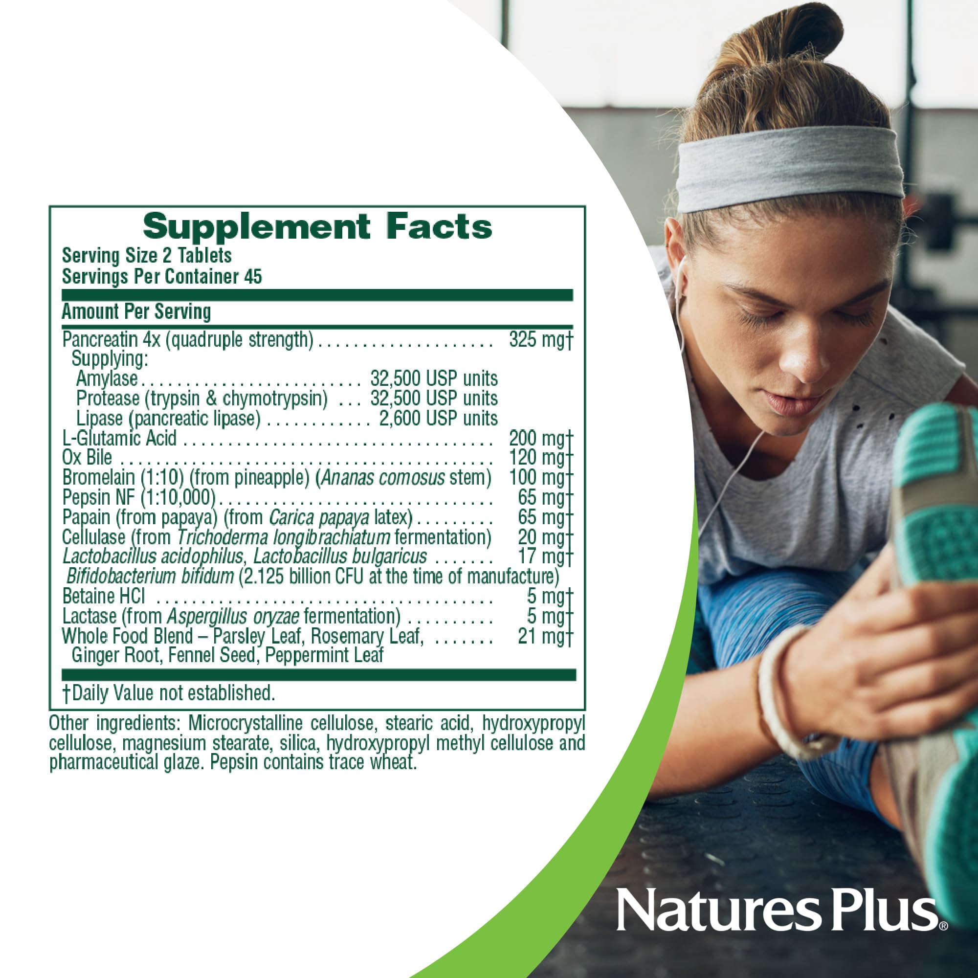 Tabletas de NaturesPlus Ultra-Zyme en mano para referencia.