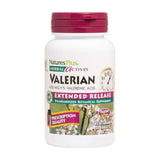 Tabletas de valeriana de NaturesPlus en frasco, apoyo para el descanso nocturno.