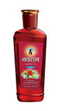 Navratna Cool Oil con ingredientes herbales para bienestar capilar.