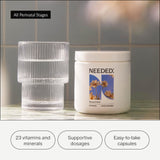 Needed multivitamínico para mujeres, envase en mano, uso diario cómodo y bienestar sostenido.
