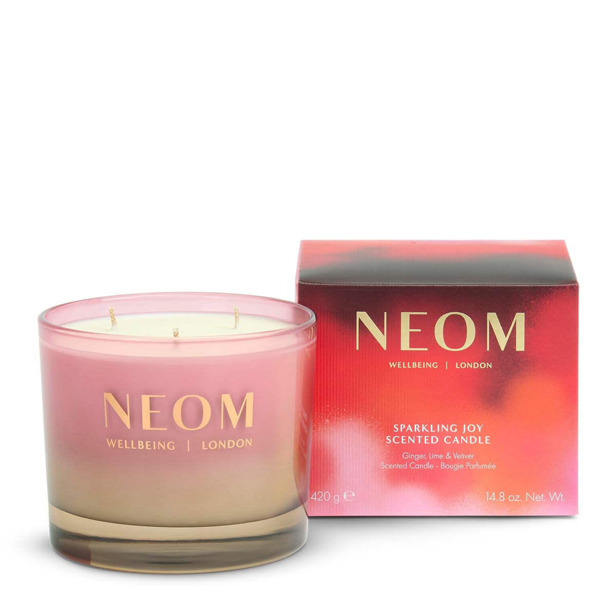 Neom Sparkling Joy: vela de tres mechas ilumina la sala con aroma cítrico.