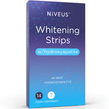 Tira blanqueadora Niveus aplicada en dientes para brillo progresivo