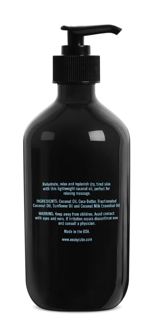 Nooky hidratación de piel con aceite de coco durante el masaje.