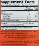 Cápsulas vegetales NOW Cranberry Concentrate sobre fondo claro para destacar pureza
