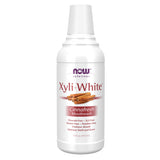 NOW Solutions XyliWhite enjuague bucal canela en botella para aliento fresco.