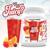 Mezcla lista de NutraBio proteína de suero clara Fruta Punch sin espuma al agitar.