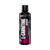 Nutrex Research L-Carnitina 3000 vaso con bebida de sabor mora
