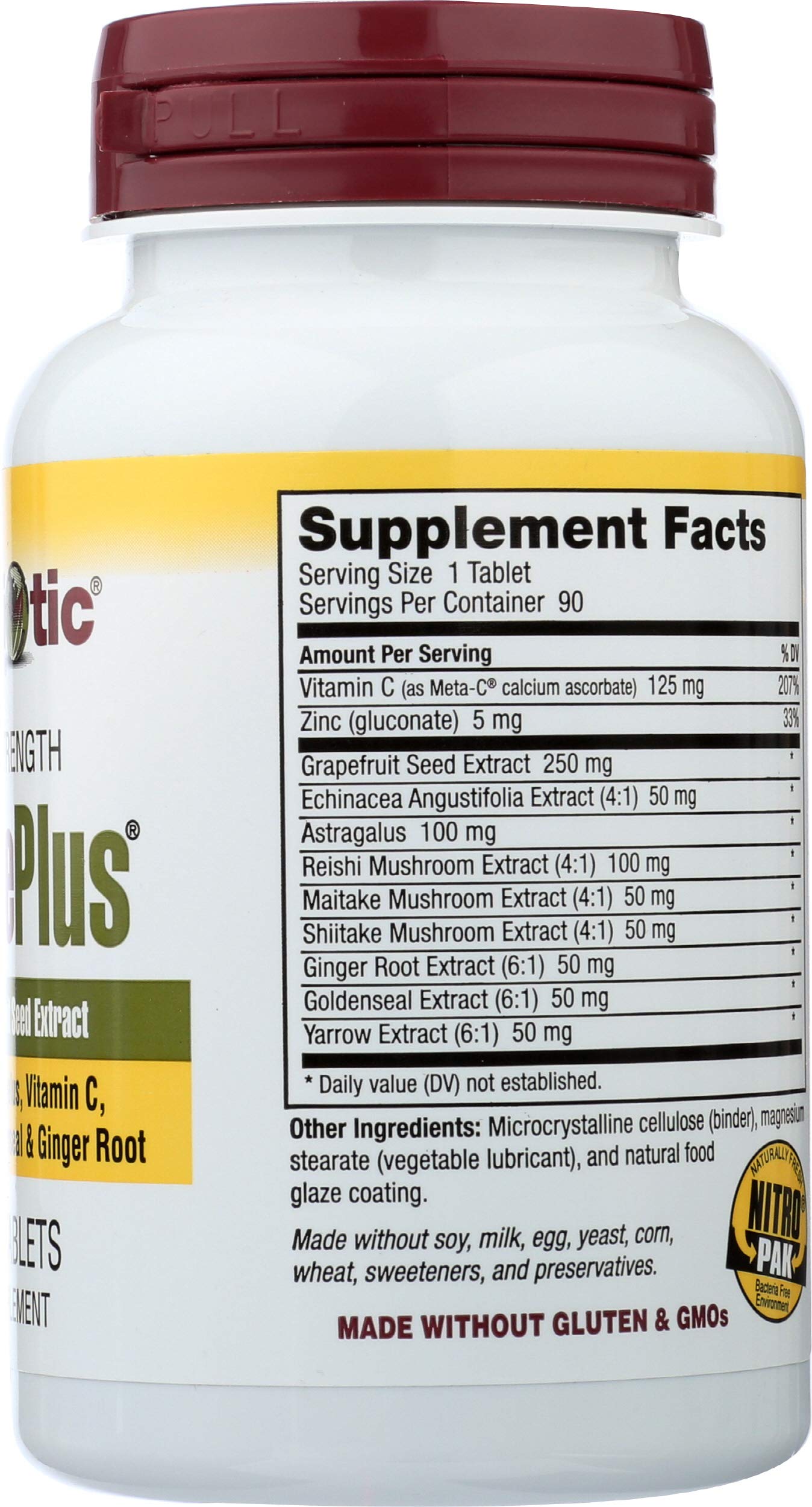 Frasco NutriBiotic DefensePlus sobre mesa, listo para rutina diaria.