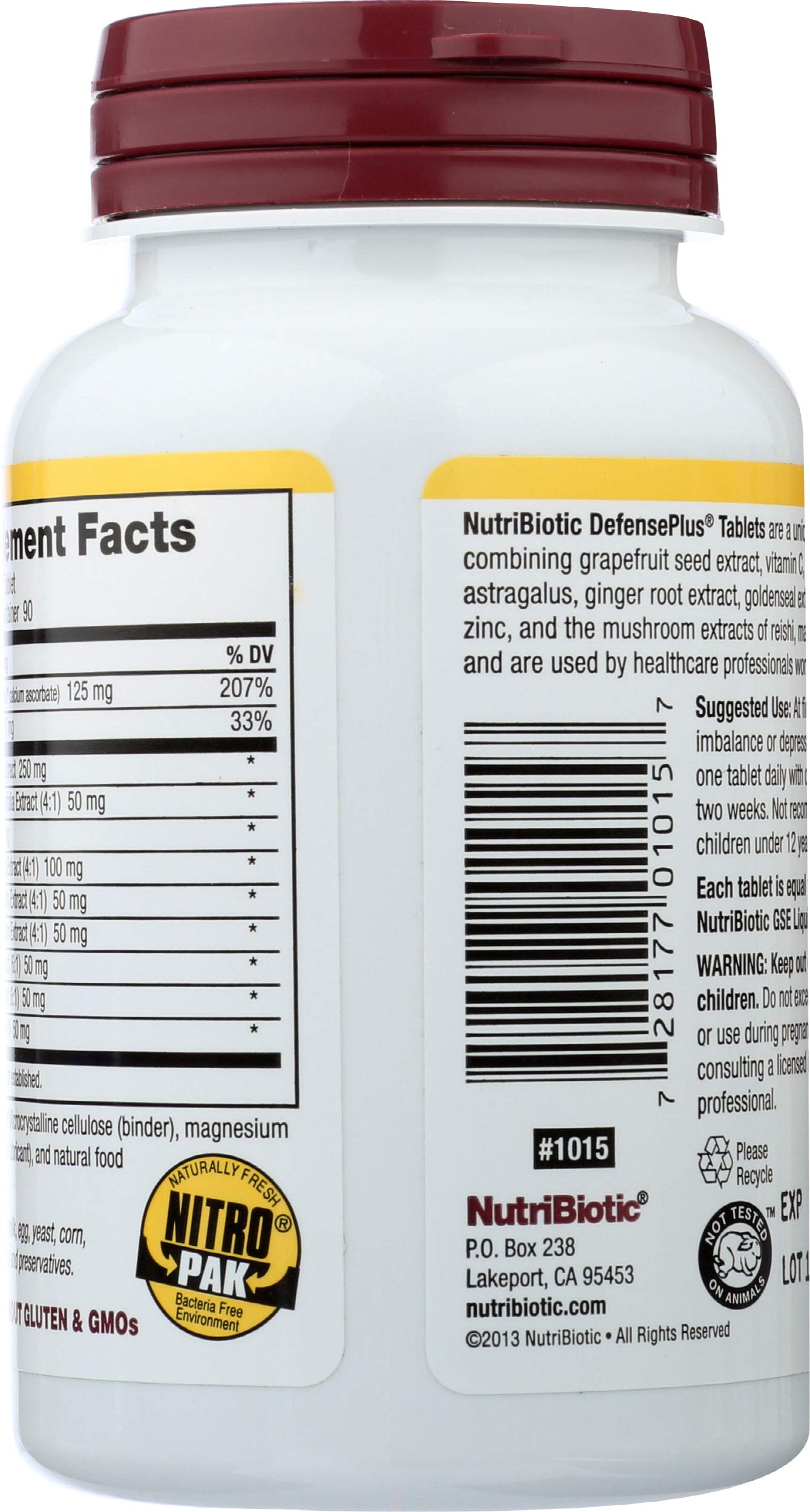 Tabletas NutriBiotic DefensePlus cerca, tamaño compacto para diario.