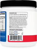 Vaso con Nutricost Creatine Energy sabor ponche de fruta para hidratación.