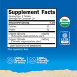 Nutricost espirulina y clorela, tabletas sobre mesa, uso diario vegano