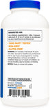 Nutricost Taurina 1000mg: cápsulas en mano para referencia de porción