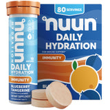 Nuun Immunity: tabletas disolviéndose en agua con sabor arándano-mandarina para hidratación