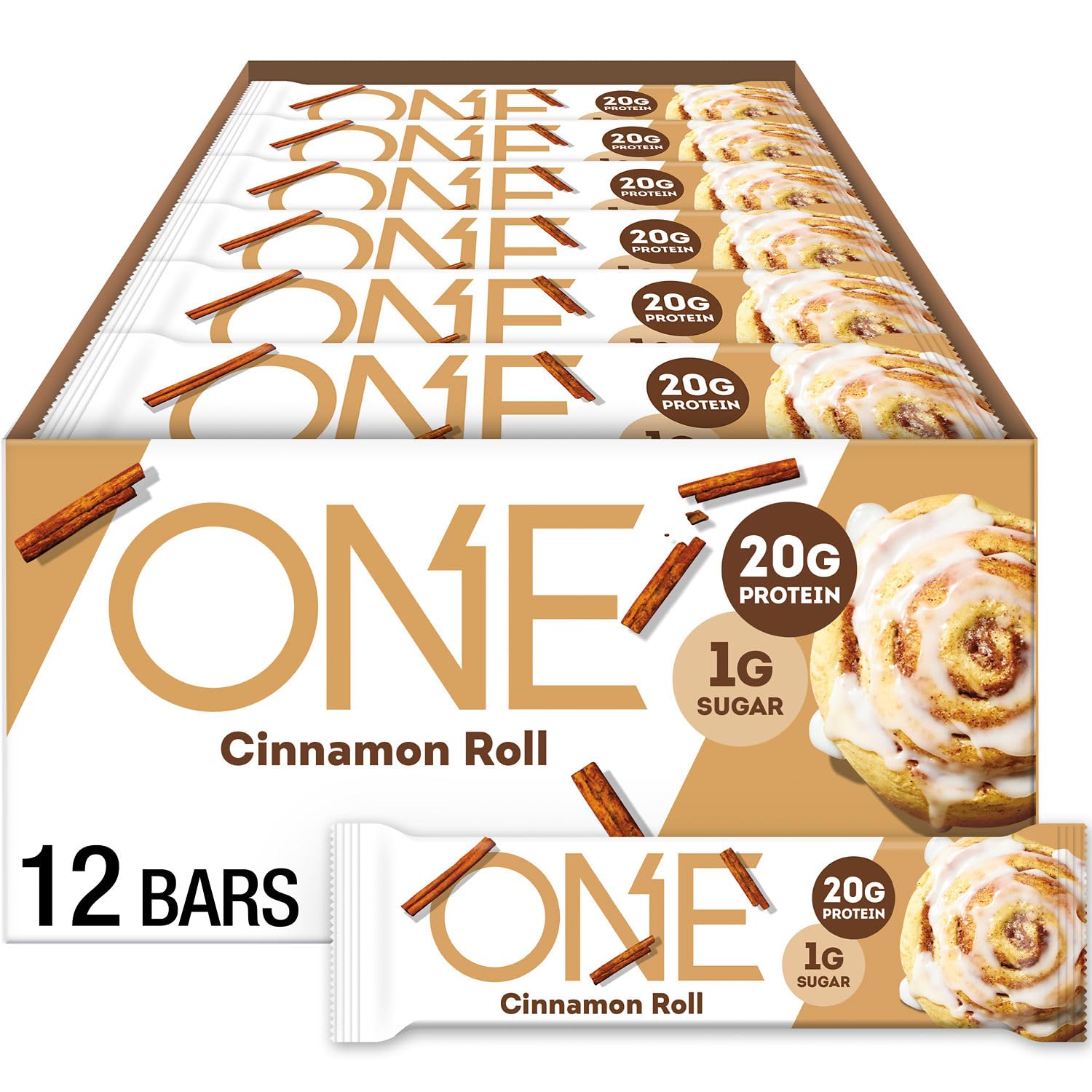 ONE barra proteina sabor rollo canela, empaque visible para desayuno rápido.