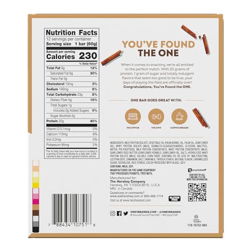 ONE barra proteina sabor rollo canela, en mano para snack pre-entrenamiento.