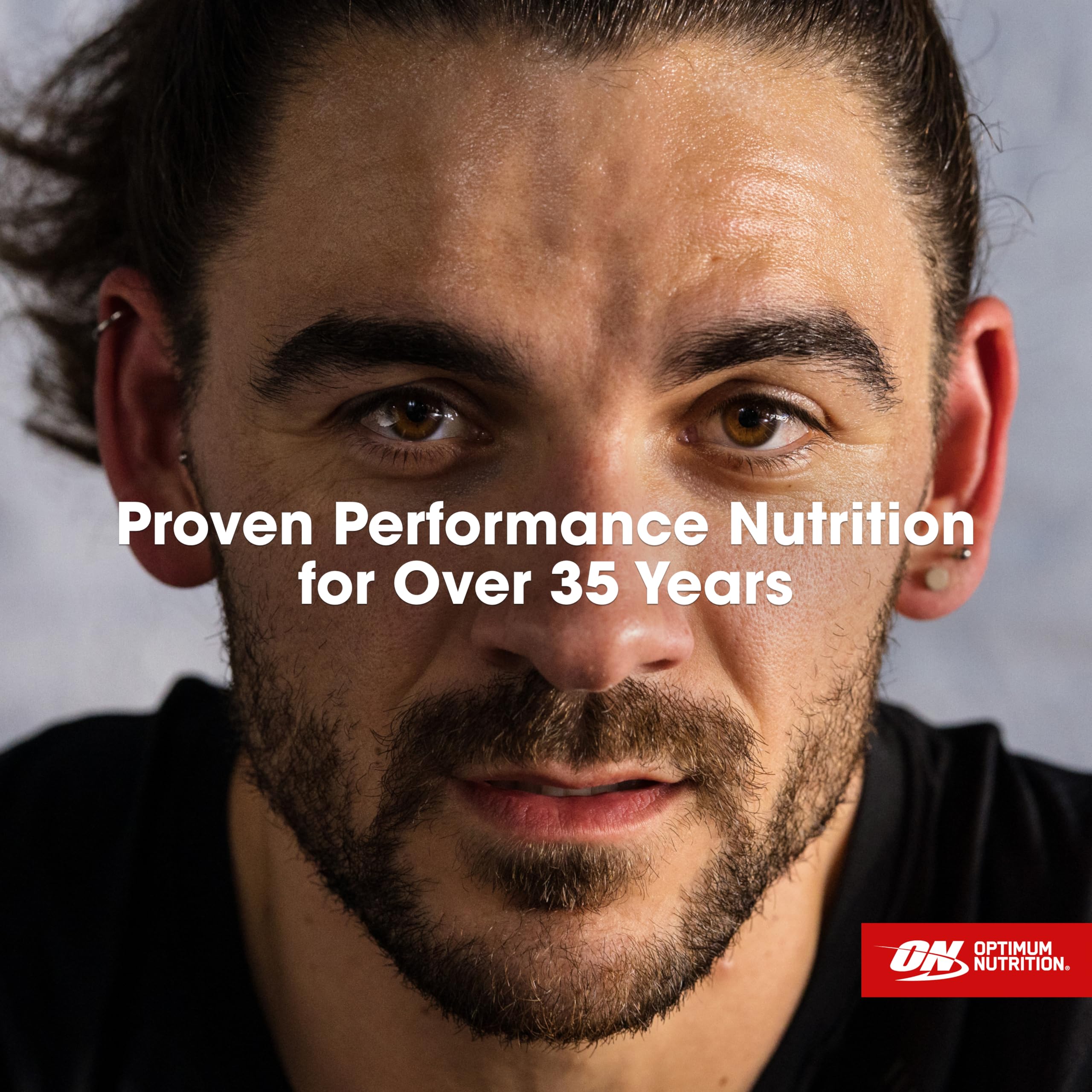 Envase de 5 libras de Optimum Nutrition Gold Standard Whey, fuente de proteína duradera.